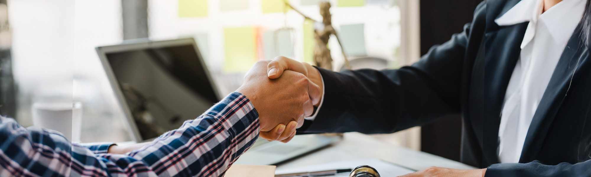 close up of woman lawyer hand and man client shaking hand collaborate on working agreements image