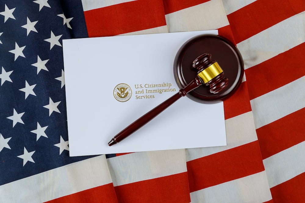 USCIS graphic with gavel image